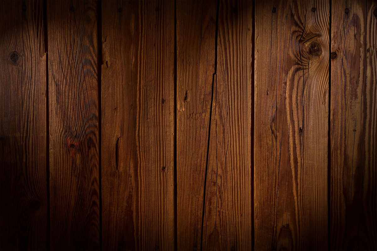 Close-up of vertical wooden planks showing natural grain patterns and knots